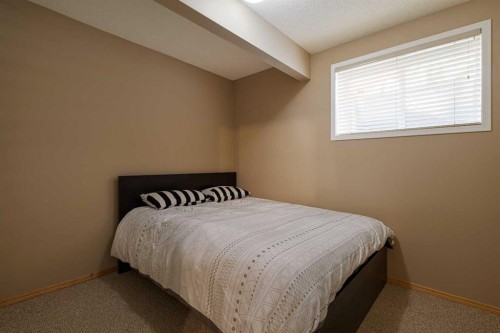 51 Brightondale Crescent Se, Calgary, AB - Indoor Photo Showing Bedroom