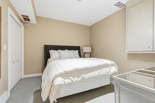 23 Prominence Point Sw, Calgary, AB - Indoor Photo Showing Bedroom