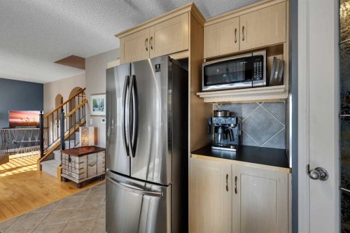 133 Rocky Ridge Heath Nw, Calgary, AB - Indoor Photo Showing Kitchen