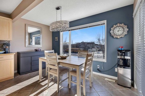 133 Rocky Ridge Heath Nw, Calgary, AB - Indoor Photo Showing Dining Room