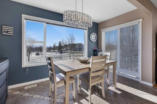 133 Rocky Ridge Heath Nw, Calgary, AB - Indoor Photo Showing Dining Room