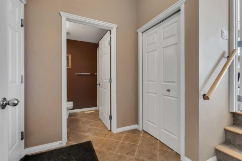 133 Rocky Ridge Heath Nw, Calgary, AB - Indoor Photo Showing Other Room