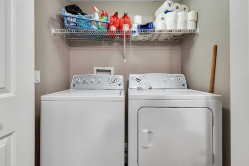 133 Rocky Ridge Heath Nw, Calgary, AB - Indoor Photo Showing Laundry Room
