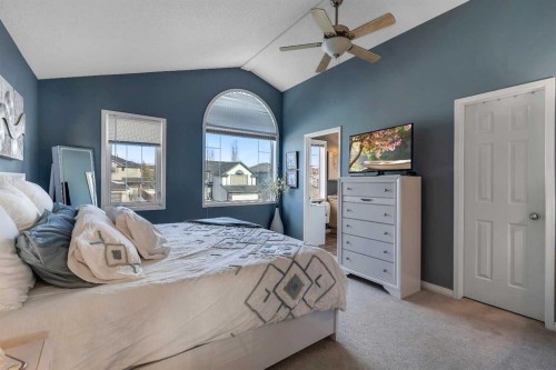 133 Rocky Ridge Heath Nw, Calgary, AB - Indoor Photo Showing Bedroom