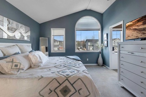 133 Rocky Ridge Heath Nw, Calgary, AB - Indoor Photo Showing Bedroom