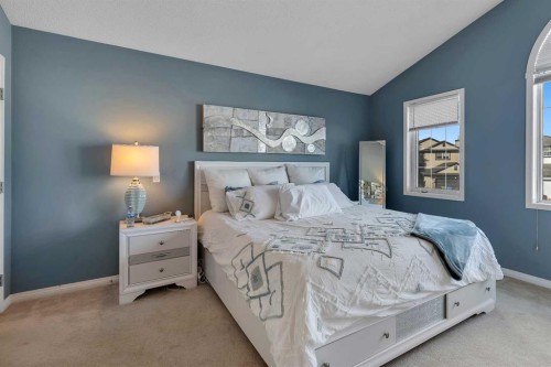133 Rocky Ridge Heath Nw, Calgary, AB - Indoor Photo Showing Bedroom