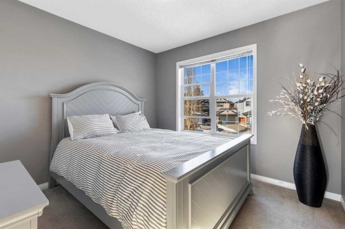 133 Rocky Ridge Heath Nw, Calgary, AB - Indoor Photo Showing Bedroom