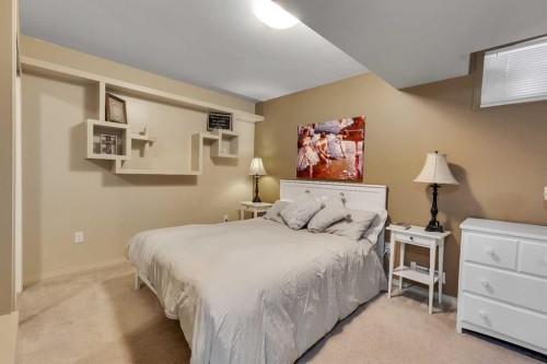 133 Rocky Ridge Heath Nw, Calgary, AB - Indoor Photo Showing Bedroom