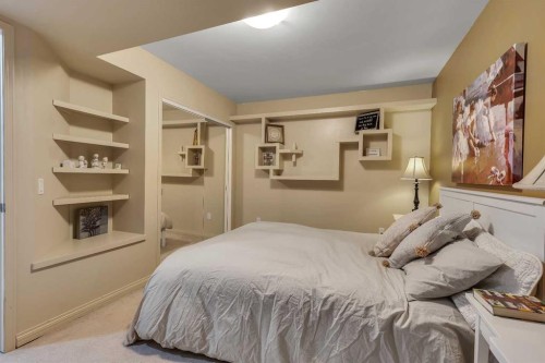 133 Rocky Ridge Heath Nw, Calgary, AB - Indoor Photo Showing Bedroom