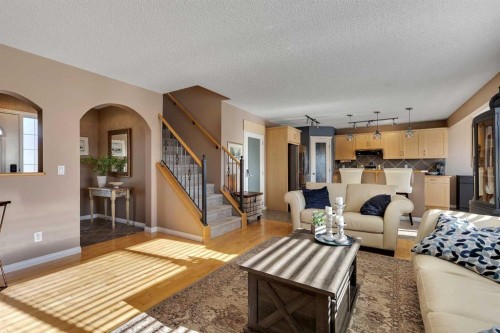 133 Rocky Ridge Heath Nw, Calgary, AB - Indoor Photo Showing Living Room