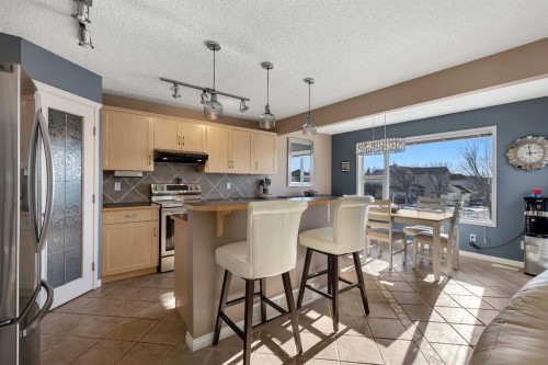 133 Rocky Ridge Heath Nw, Calgary, AB - Indoor Photo Showing Other Room