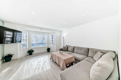 883 Arbour Lake Road Nw, Calgary, AB - Indoor Photo Showing Living Room