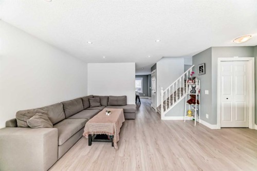 883 Arbour Lake Road Nw, Calgary, AB - Indoor Photo Showing Living Room