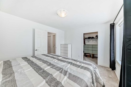 883 Arbour Lake Road Nw, Calgary, AB - Indoor Photo Showing Bedroom