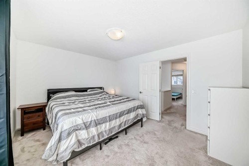 883 Arbour Lake Road Nw, Calgary, AB - Indoor Photo Showing Bedroom