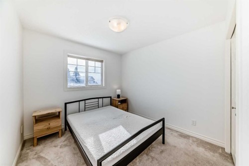 883 Arbour Lake Road Nw, Calgary, AB - Indoor Photo Showing Bedroom