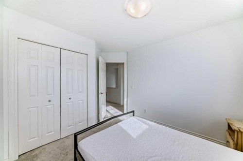 883 Arbour Lake Road Nw, Calgary, AB - Indoor Photo Showing Bedroom