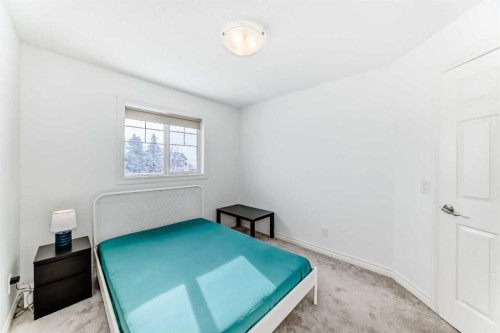 883 Arbour Lake Road Nw, Calgary, AB - Indoor Photo Showing Bedroom
