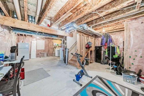 883 Arbour Lake Road Nw, Calgary, AB - Indoor Photo Showing Basement