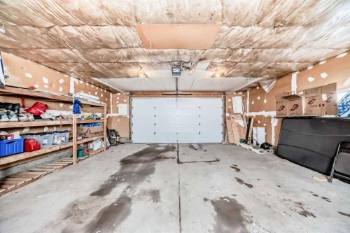 883 Arbour Lake Road Nw, Calgary, AB - Indoor Photo Showing Garage