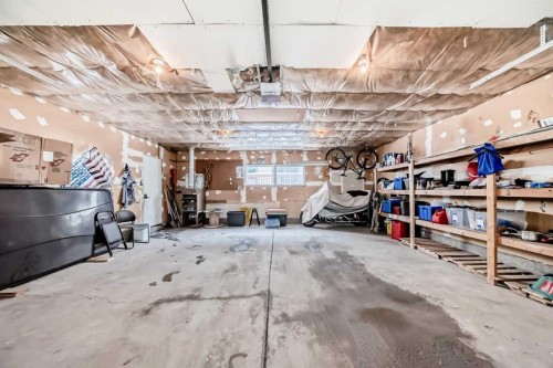 883 Arbour Lake Road Nw, Calgary, AB - Indoor Photo Showing Garage