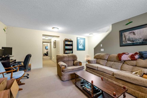 172 Prestwick Heights Se, Calgary, AB - Indoor Photo Showing Living Room