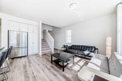 53 Spring Creek Common Sw, Calgary, AB - Indoor Photo Showing Living Room