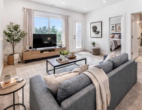 53 Spring Creek Common Sw, Calgary, AB - Indoor Photo Showing Living Room