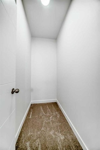 53 Spring Creek Common Sw, Calgary, AB - Indoor Photo Showing Other Room