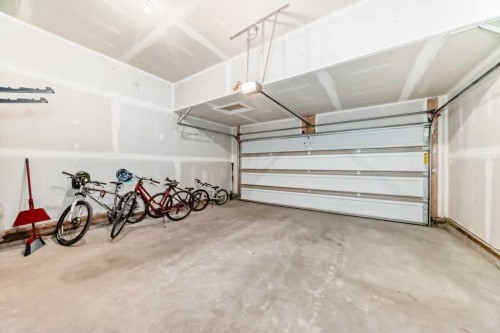 53 Spring Creek Common Sw, Calgary, AB - Indoor Photo Showing Garage