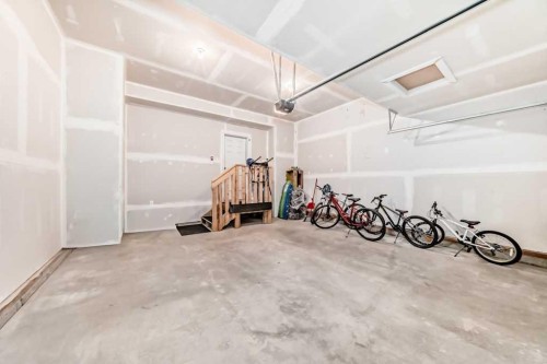 53 Spring Creek Common Sw, Calgary, AB - Indoor Photo Showing Garage
