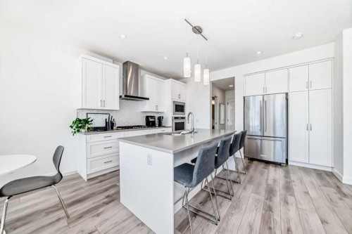 53 Spring Creek Common Sw, Calgary, AB - Indoor Photo Showing Kitchen With Stainless Steel Kitchen With Upgraded Kitchen