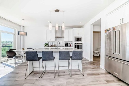 53 Spring Creek Common Sw, Calgary, AB - Indoor Photo Showing Kitchen With Stainless Steel Kitchen With Upgraded Kitchen