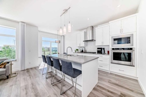 53 Spring Creek Common Sw, Calgary, AB - Indoor Photo Showing Kitchen With Stainless Steel Kitchen With Upgraded Kitchen
