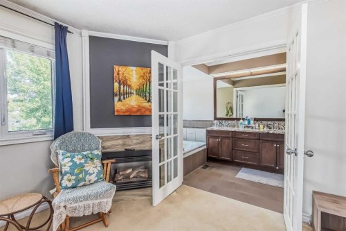8-834 2 Avenue Nw, Calgary, AB - Indoor With Fireplace