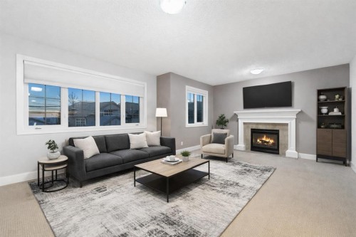 70 Royal Ridge Manor Nw, Calgary, AB - Indoor Photo Showing Living Room With Fireplace