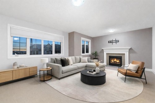 70 Royal Ridge Manor Nw, Calgary, AB - Indoor Photo Showing Living Room With Fireplace