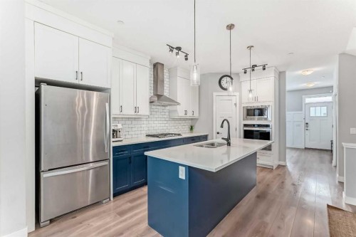 129 Lucas Crescent Nw, Calgary, AB - Indoor Photo Showing Kitchen With Double Sink With Upgraded Kitchen