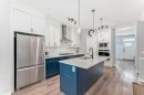 129 Lucas Crescent Nw, Calgary, AB  - Indoor Photo Showing Kitchen With Double Sink With Upgraded Kitchen 
