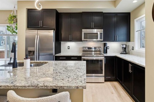305 Mahogany Boulevard Se, Calgary, AB - Indoor Photo Showing Kitchen With Upgraded Kitchen