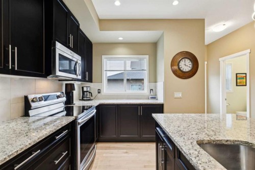 305 Mahogany Boulevard Se, Calgary, AB - Indoor Photo Showing Kitchen With Upgraded Kitchen