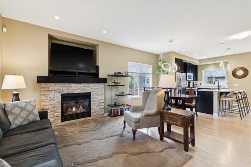 305 Mahogany Boulevard Se, Calgary, AB - Indoor Photo Showing Living Room With Fireplace