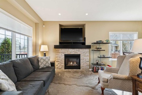 305 Mahogany Boulevard Se, Calgary, AB - Indoor Photo Showing Living Room With Fireplace