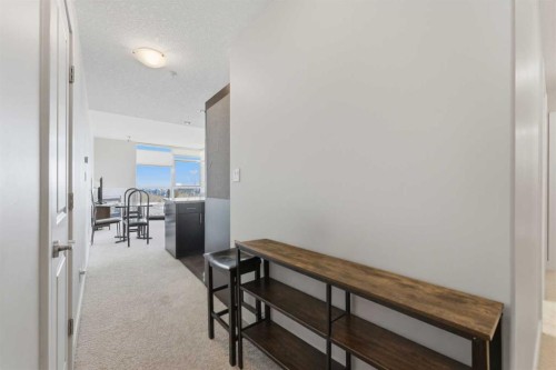 702-77 Spruce Place Sw, Calgary, AB - Indoor Photo Showing Other Room