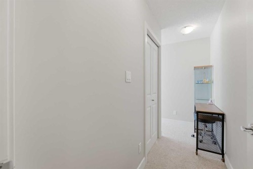 702-77 Spruce Place Sw, Calgary, AB - Indoor Photo Showing Other Room