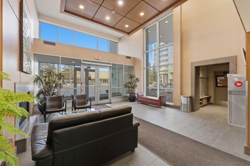 702-77 Spruce Place Sw, Calgary, AB - Indoor Photo Showing Other Room