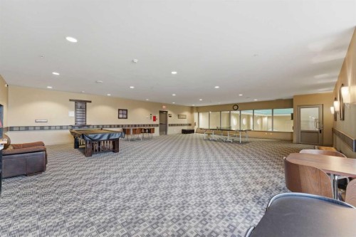 702-77 Spruce Place Sw, Calgary, AB - Indoor Photo Showing Other Room