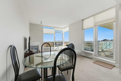 702-77 Spruce Place Sw, Calgary, AB - Indoor Photo Showing Other Room