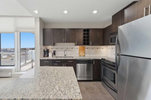 702-77 Spruce Place Sw, Calgary, AB - Indoor Photo Showing Kitchen