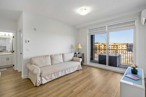 2406-200 Seton Circle Se, Calgary, AB - Indoor Photo Showing Living Room